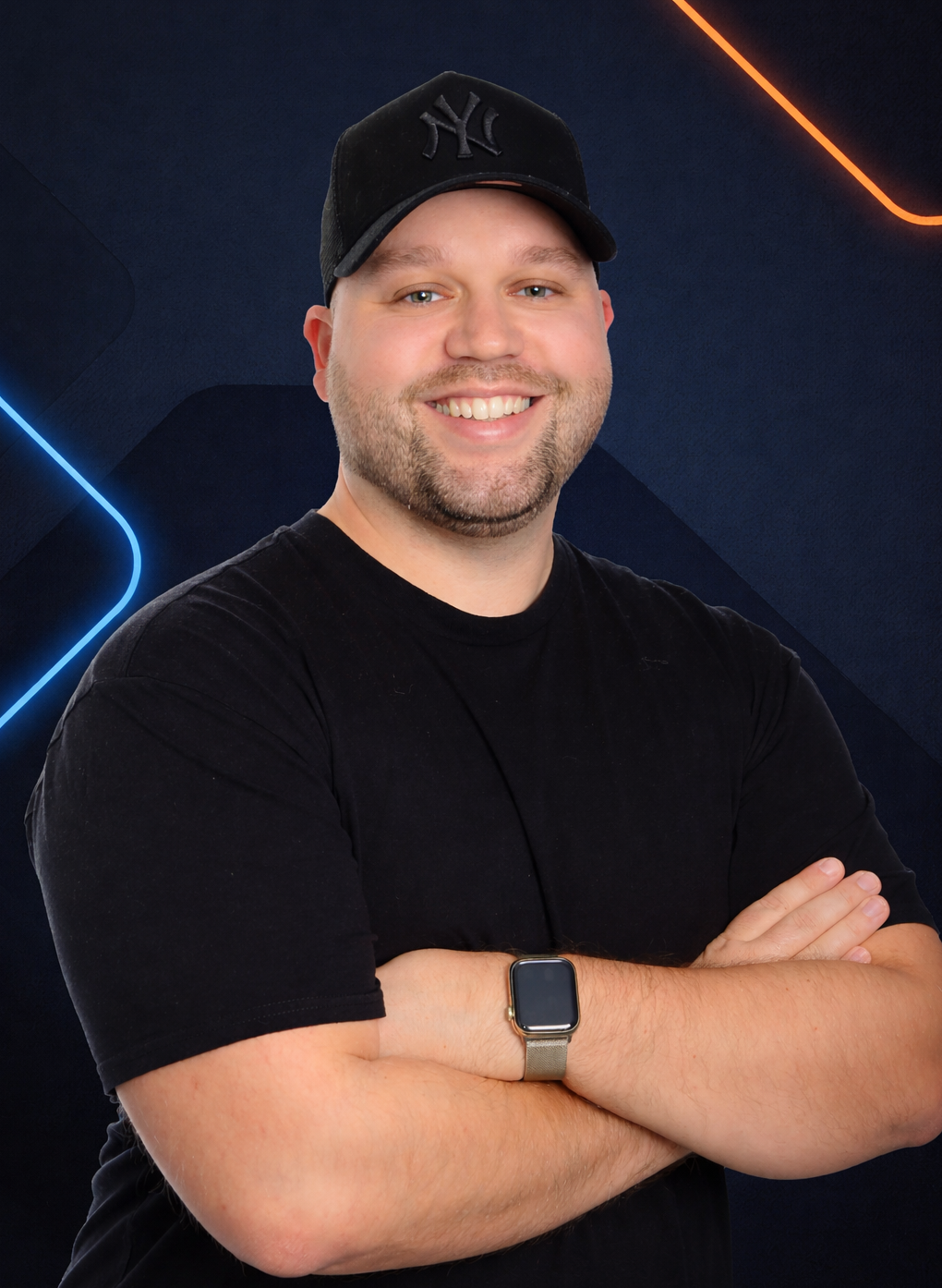 Andre smiling in a black shirt